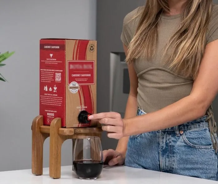 Fancy Up Boxed Wine With The <a Style="Display:inline;" Href="Https://Www.amazon.com/Stand-Box-Wine-Perfect-Dispenser/Dp/B0d8gh4qc3?crid=1hxlc27cfmbss&dib=eyj2ijoimsj9.eikolwji-Hvsj5teph8tjfjyijsbhrb9clh8ozsbcagwdtxpax_bdalefdvyvmpihxrmybqi-2yebovfnxfnk7lmnwfljkrkk-Fgt00u0onqce1kyxnp_doo5pgii4tygo-Vvgaug4j3q_9yxjkdjqv3zy4pfebrz-V7evxb1vshrkdcnrmu0kx8wktonp64bv4jrktu9sajykxnyfyeftuiyhfv2yovq0pmdah_zd035mnx97n3jbb7kiyiksgd6remp-Bwyxgnil-1bfqahrh_w98goez7nznkm6otsyl-2oxxgjidmtcl8ja8ubc06y7j-4e2nhz5-Dyok-Kth7jp-5t4f9vgx4svqoym0vbgh69zfvk1aae1o4yxsu536aj13xu52i7hb_onjscpjdnjv6xzpkilb7y-Njrux4pu-3q4nzsb7ixng4-Sagla.nmpmaokfqr24gjy2qht8mmxwmgnguve8y5rm1qbsmxg&dib_tag=se&keywords=wine%2bbox%2bstand&qid=1743505836&sprefix=wine%2bbox%2bstan%2caps%2c234&sr=8-2&th=1&linkcode=ll1&tag=bpseal-20&linkid=3f456da9724f1a39c9c2a63a915d8d56&language=en_us&ref_=as_li_ss_tl" Target="_blank"><span Style="Font: Inherit; Color: #d74b1f;"> Boxed Wine Holder </Span>, Because Classiness And Boxed Wine Can Exist In The Same Dimension
