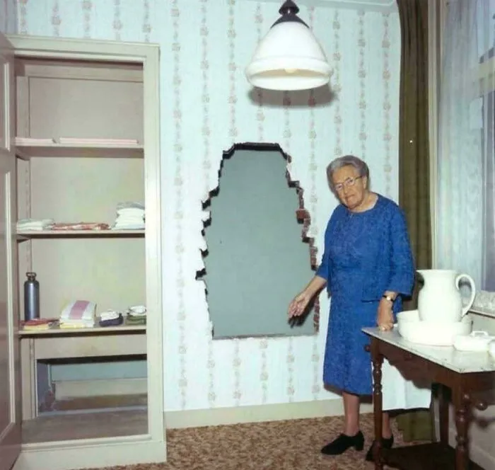 A Woman Named Corrie Ten Boom Showing The Secret Hiding Place Her Family Constructed In Her Attic Bedroom To Shelter Jewish People And Resistance Members In Haarlem, Holland During Wwii