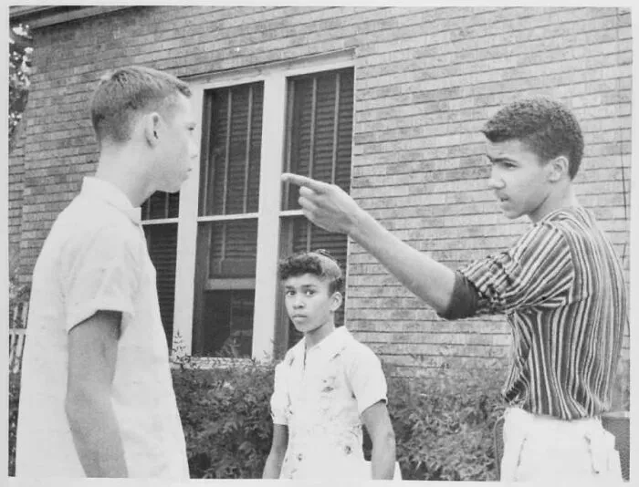 Fifteen-Year-Old Johnny Gray Confronts One Of The Two White Boys Who Tried To Force Him And His Sister, Mary, From The Sidewalk As They Walked To School In Little Rock, Arkansas On September 16, 1958