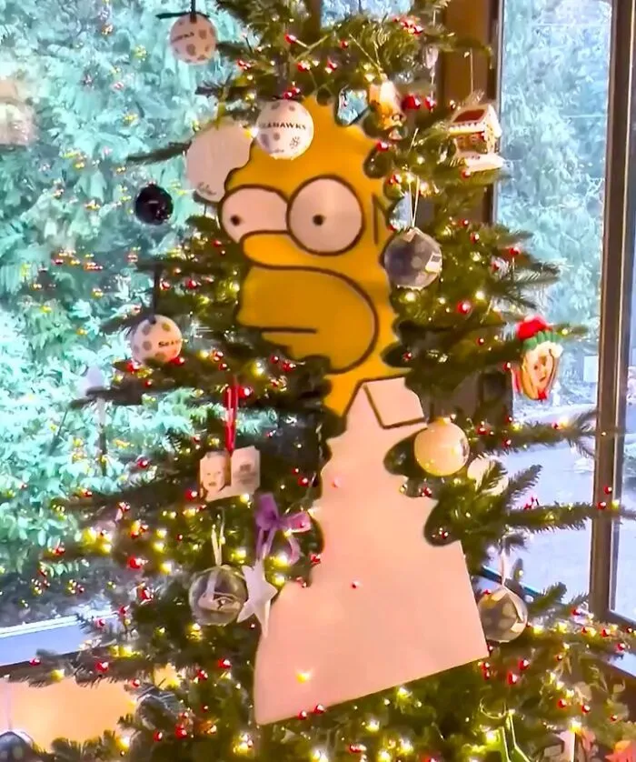 Street Artist Uses Paper Cutouts Of The Simpsons To Interact With The World Around Them (15 Pics)