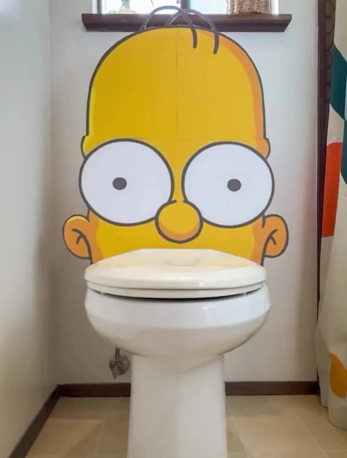 Street Artist Uses Paper Cutouts Of The Simpsons To Interact With The World Around Them (15 Pics)