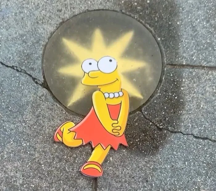 Street Artist Uses Paper Cutouts Of The Simpsons To Interact With The World Around Them (15 Pics)