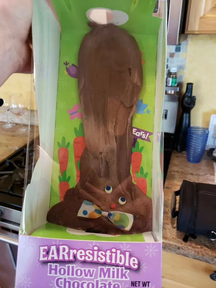 Melted chocolate bunny with eyes and a bowtie, illustrating people having a worse day.