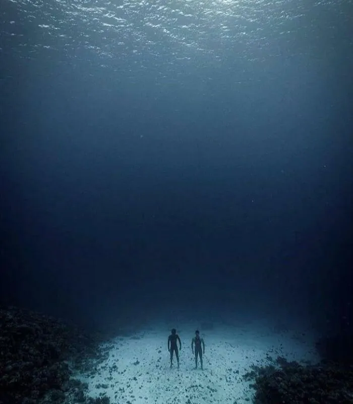Just Seeing Two People Stand On The Ocean Floor Is Strangely Unsettling