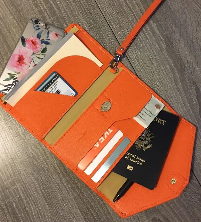 Keep Your Passport Info Safe From Sneaky Digital Scans While Looking Vaguely Official With An <a Style="Display:inline;" Href="Https://Www.amazon.com/Zoppen-Multi-Purpose-Travel-Wallet-Ver-4/Dp/B072zwqnvf?ie=utf8&linkcode=ll1&tag=bpiguana-20&linkid=97a92854d18d7aa739f70c7295677d10&language=en_us&ref_=as_li_ss_tl" Target="_blank"><span Style="Font: Inherit; Color: #d74b1f;"> Rfid Blocking Passport Holder Wallet </Span> Because Apparently High-Tech Pickpocketing Is A Thing We Have To Worry About Now