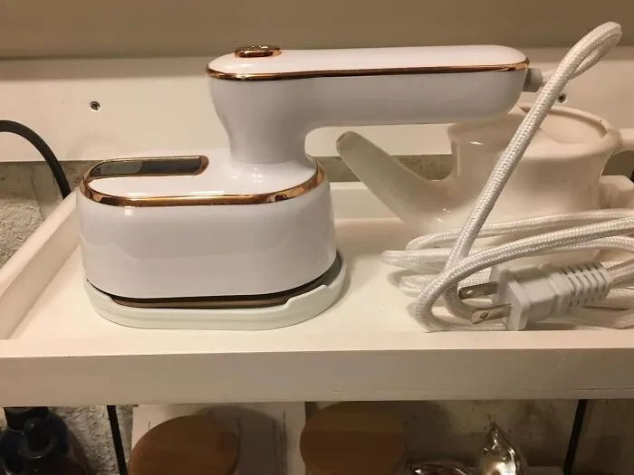Avoid Looking Like You Slept In Your Clothes (Even If You Kinda Did On The Plane) By Tucking <a Style="Display:inline;" Href="Https://Www.amazon.com/Steamer-Iron-Clothes-Travel-Essentials-Purple/Dp/B0cnyvlvwg?ie=utf8&th=1&linkcode=ll1&tag=bpiguana-20&linkid=46f3c0735095dd630e40f2a921263933&language=en_us&ref_=as_li_ss_tl" Target="_blank"><span Style="Font: Inherit; Color: #d74b1f;"> A Mighty Mini Steamer </Span> Into Your Bag, Because Hotel Irons Are Often Suspicious At Best