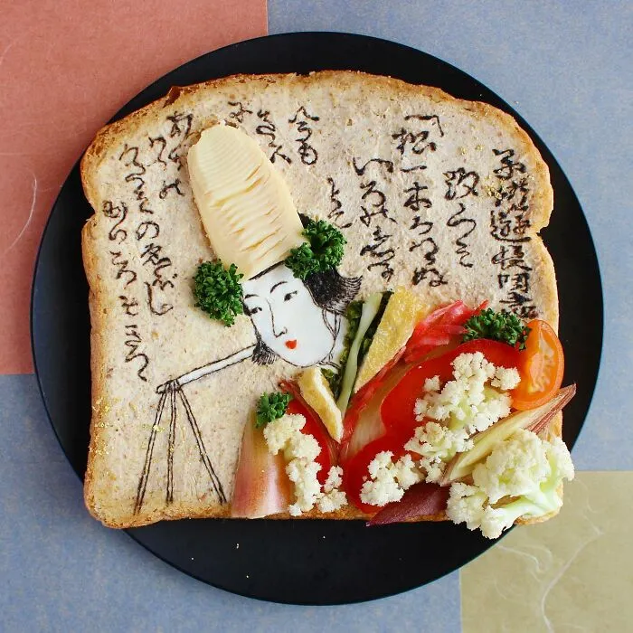 Creative toast art by Japanese artist featuring a geisha design with vegetables and detailed illustrations.