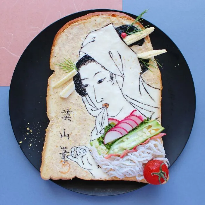 Creative toast design by Japanese artist featuring a face with vegetable accents on bread.