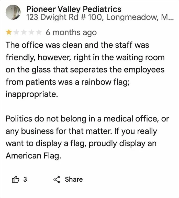 Customer review expressing concern over political symbols in a medical office reflecting current life in the US.