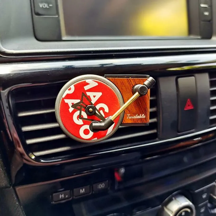 Their Car Might Still Smell Like It Has Fuzzy Dice Hanging From The Mirror, But You Can At Least Upgrade The *look* Of The Air Freshener With A Miniature <a Style="Display:inline;" Href="Https://Www.amazon.com/Dp/B09xk27ygc?asc_item-ID=amzn1.ideas.1npjq75fy8u6n&linkcode=ll1&tag=bpferret-20&linkid=5d652bf354cd5cc6edf9dfd74c41ad0d&language=en_us&ref_=as_li_ss_tl" Target="_blank"><span Style="Font: Inherit; Color: #d74b1f;"> Record Player Air Freshener For The Car Vent </Span>