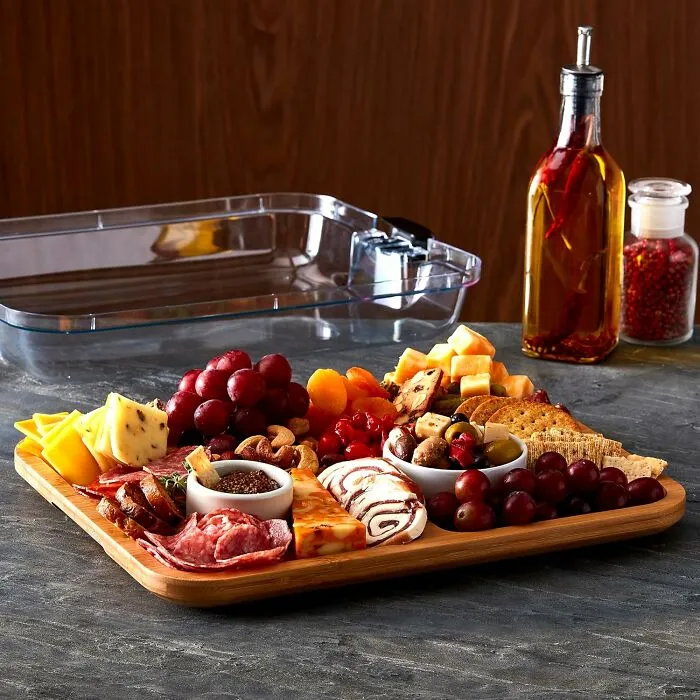 Now They Can Prep Their Extremely Fancy Adult Lunchables Way Ahead Of Time Without Anything Getting Weird, All Thanks To A <a Style="Display:inline;" Href="Https://Www.amazon.com/Dp/B0ckbyp86c?asc_item-ID=amzn1.ideas.1nbaxehhw20al&th=1&linkcode=ll1&tag=bpferret-20&linkid=0102f7f36efeced4c9e2ec03904003cf&language=en_us&ref_=as_li_ss_tl" Target="_blank"><span Style="Font: Inherit; Color: #d74b1f;"> Charcuterie Board With A Lid </Span>