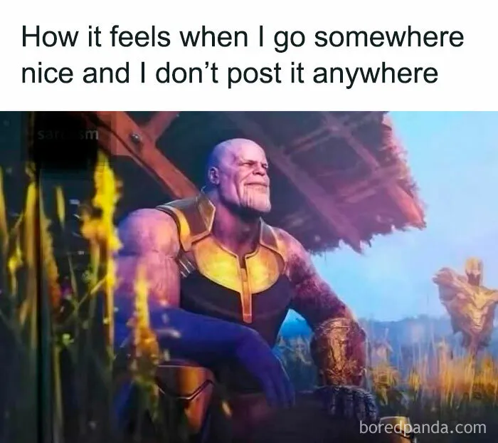 Thanos sitting peacefully in a field, reflecting the humor of not sharing a nice outing on social media. Funny memes vibe.