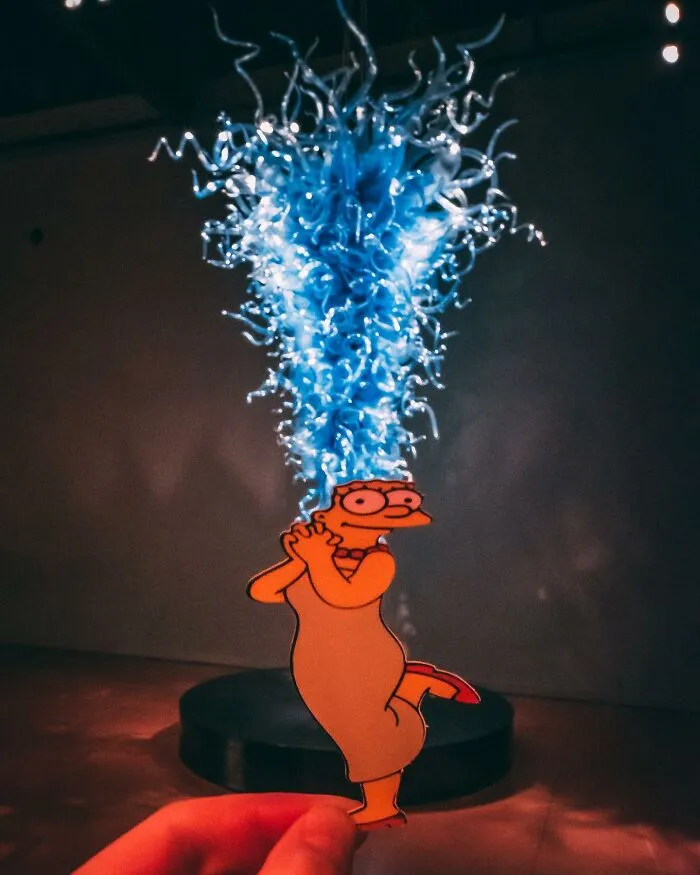 Street Artist Uses Paper Cutouts Of The Simpsons To Interact With The World Around Them (15 Pics)