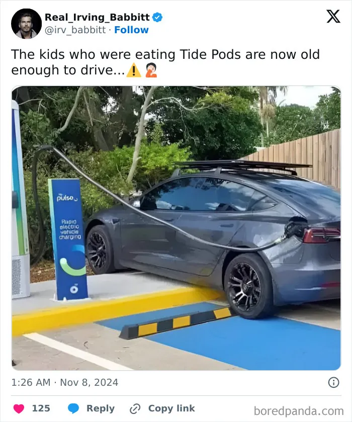 Electric car meme showing humorous misplacement of charging cable.