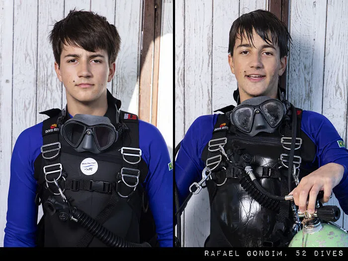 Portrait of a diver, before and after a dive, in scuba gear with a wooden background.