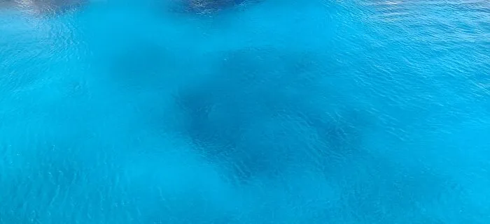 I Thought Belize Was Very Pretty.  Those Dark Spots Are A Rock Formation On The Bottom Of ~30m Water Depth.  The Water There Is So Blue And So Clear