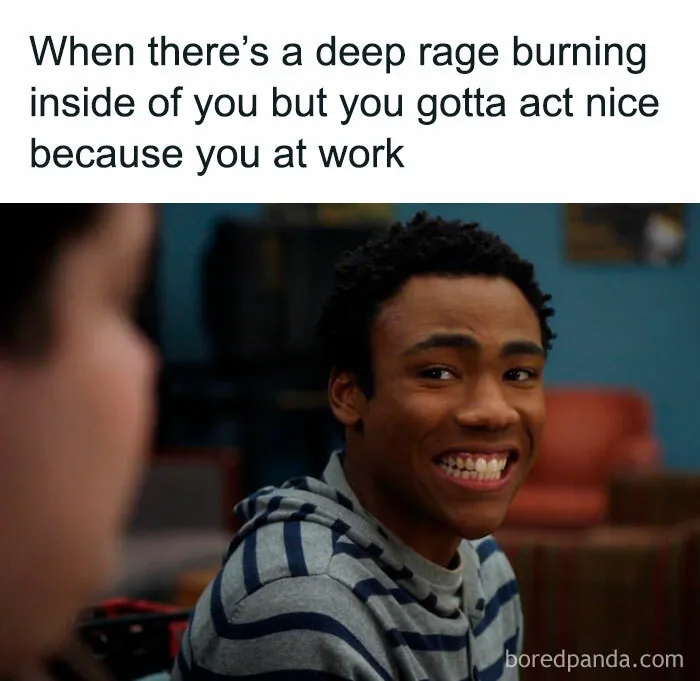Man wearing a striped shirt smiling awkwardly, capturing a funny yet relatable work moment with humorous text above.