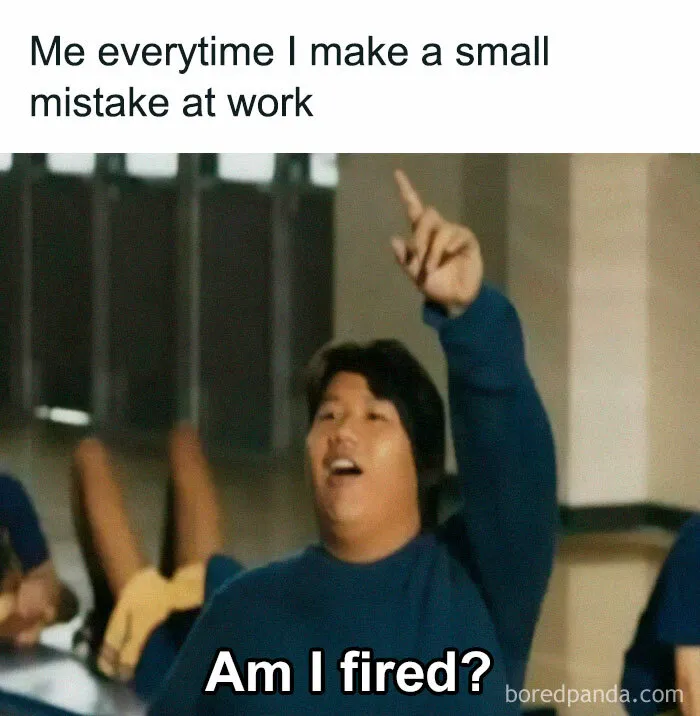 Person raising hand humorously asking, "Am I fired?" in a funny relatable work meme setting.