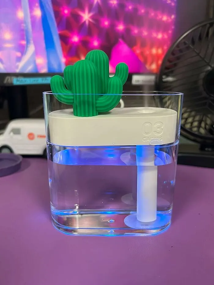 Combat That Dry Office Air (And Add A Touch Of Desert Chic) With This Cute Little <a Style="Display:inline;" Href="Https://Www.amazon.com/Aoloda-Humidifier-Humidifier-Ultra-Quiet-Operation/Dp/B078zrcm76?pd_rd_r=353ee148-A607-4673-8faf-57c18dcfc5ac&pd_rd_wg=7svnb&pd_rd_w=nx4ns&pd_rd_i=b078zrcm76&th=1&linkcode=ll1&tag=bpbuffalo-20&linkid=5d97637403197aac2261d2df65965489&language=en_us&ref_=as_li_ss_tl" Target="_blank"><span Style="Font: Inherit; Color: #d74b1f;"> Desktop Cactus Humidifier </Span>
