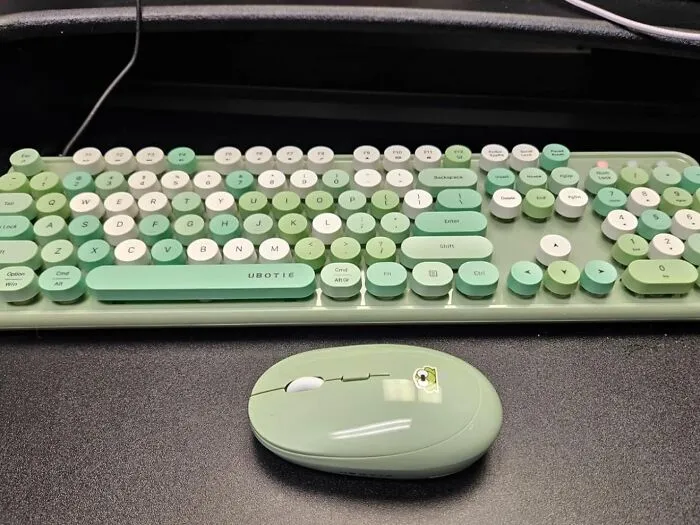 Your Sad, Beige Desk Is About To Get A Serious Personality Injection, And It Starts With This Vibrant <a Style="Display:inline;" Href="Https://Www.amazon.com/Ubotie-Typewriter-Full-Sized-Dropout-Free-Green-Colorful/Dp/B087jw1hgx?ie=utf8&th=1&linkcode=ll1&tag=bpbuffalo-20&linkid=6f53922d261d3b591c6d55b5643955a8&language=en_us&ref_=as_li_ss_tl" Target="_blank"><span Style="Font: Inherit; Color: #d74b1f;"> Colorful Wireless Keyboard And Mouse Combo </Span>