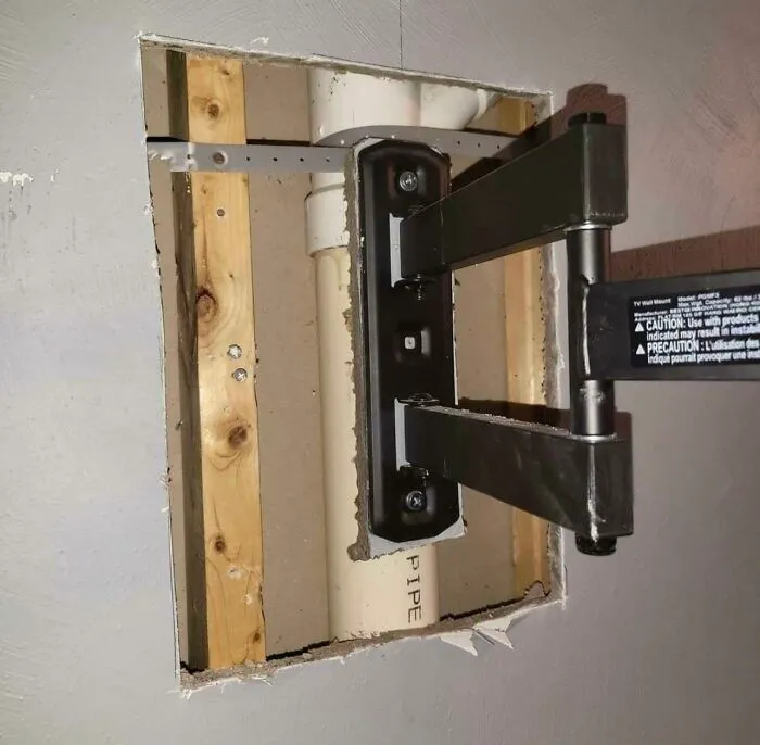 Geek Squad Mounted My TV To The Sewage Pipe