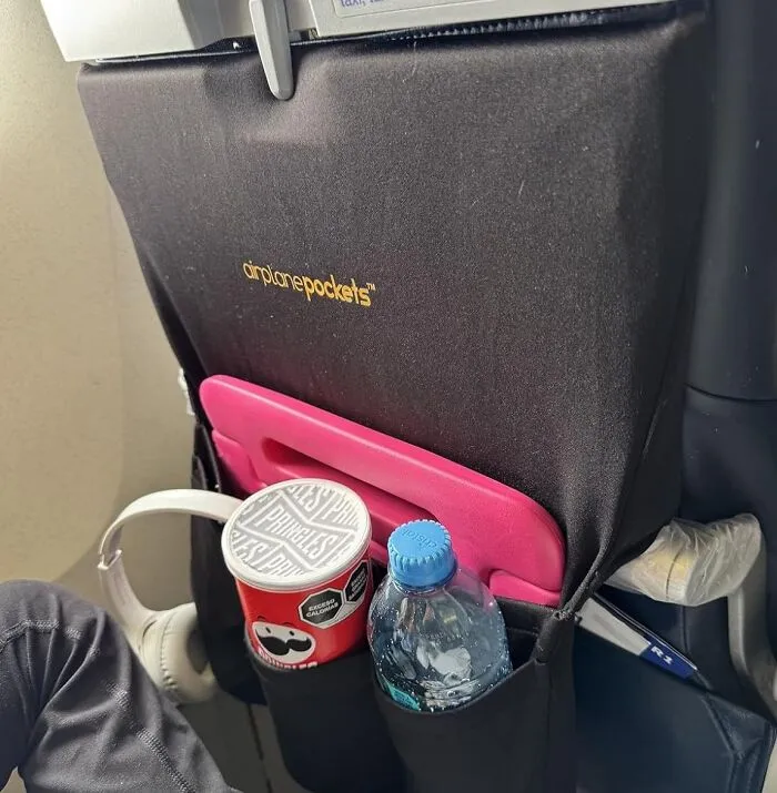 Your In-Flight Essentials Are About To Get A Major Organization Upgrade With These <a Style="Display:inline;" Href="Https://Www.amazon.com/Airplane-Tray-Cover-Travel-Essentials/Dp/B07wcxp7ch?ie=utf8&linkcode=ll1&tag=bphamster-20&linkid=5cfc903a8e97a77421ee610e98fd7d33&language=en_us&ref_=as_li_ss_tl" Target="_blank"><span Style="Font: Inherit; Color: #d74b1f;"> Airplane Seat Pockets </Span>, Because Digging For Your Lip Balm Shouldn't Require A Full Excavation