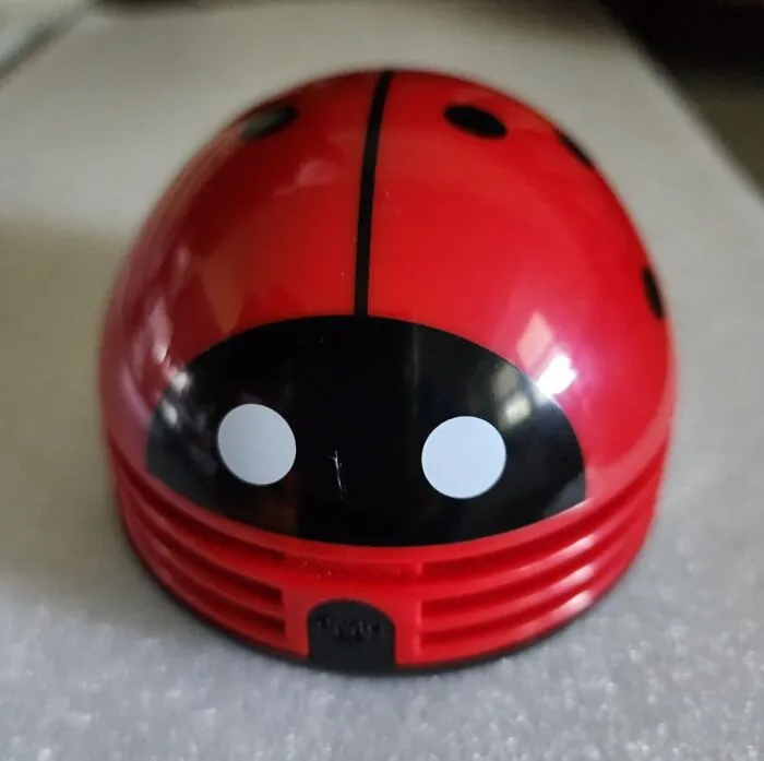 Your Sad Desk Lunch Crumbs Are Probably Already Staging A Tiny, Depressing Protest By 10 Am On A Monday, But This Adorable <a Style="Display:inline;" Href="Https://Www.amazon.com/Portable-Ladybug-Cartoon-Desktop-Cleaner/Dp/B00r4iqq5o?ie=utf8&th=1&linkcode=ll1&tag=bpsheep-20&linkid=5a11e45cdb3f73d8acfd4106fd79195a&language=en_us&ref_=as_li_ss_tl" Target="_blank"><span Style="Font: Inherit; Color: #d74b1f;"> Ladybug Desktop Vacuum </Span> Is Here To Politely Escort Them Away, Leaving Only Slightly Less Despair