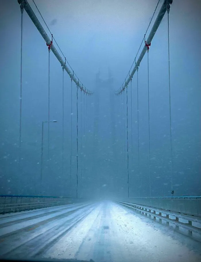 A Bridge In Norway While Snowing