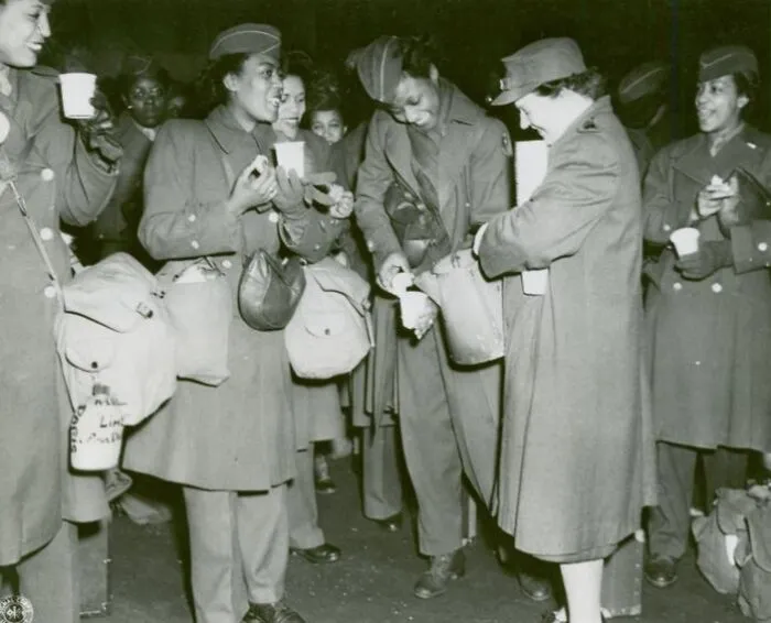 Wacs Stand With Their Coffee And Doughnuts