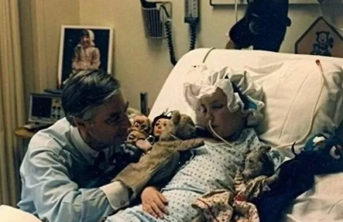 Fred Rogers Performing A "Bedside Solo Show" For 7-Year Old Beth Usher During Her Coma After Undergoing Surgery For "Rasmussen’s Encephalitis" At The John Hopkins Childrens' Hospital In Baltimore, Maryland, 1987