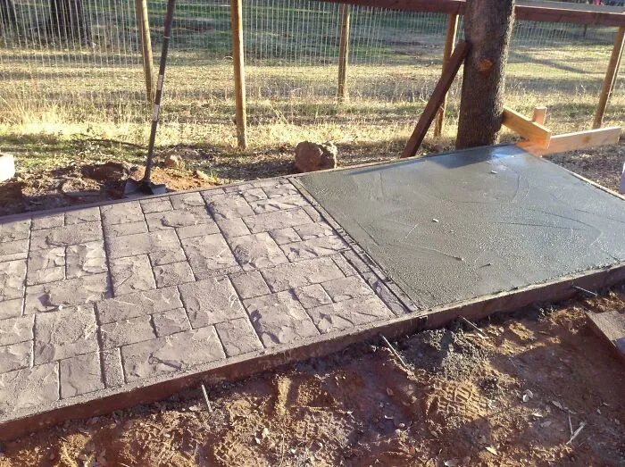 Concrete walkway showing before and after photos of stamped and freshly poured wet concrete outdoors.