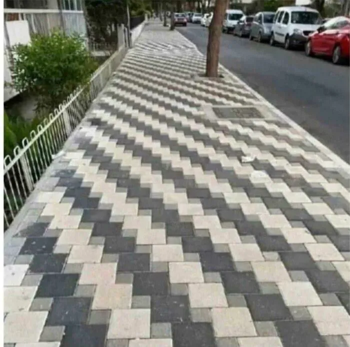 This Sidewalk Brick Layout. Perfect To Lose Balance Or Trip