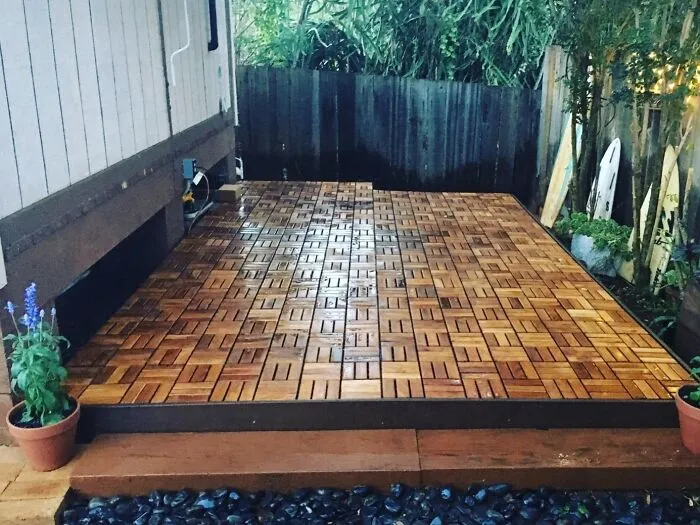 You Can Basically LEGO Your Way To A Boujee New Patio This Weekend With These <a Style="Display:inline;" Href="Https://Www.amazon.com/Bare-Decor-Bare-Wf2009-Interlocking-Flooring/Dp/B00j8slw16?ie=utf8&th=1&linkcode=ll1&tag=bpkoala-20&linkid=726c0bbd9d9de24854afa0a97a2f0394&language=en_us&ref_=as_li_ss_tl" Target="_blank"><span Style="Font: Inherit; Color: #d74b1f;"> Interlocking Teak Outdoor Tiles </Span>