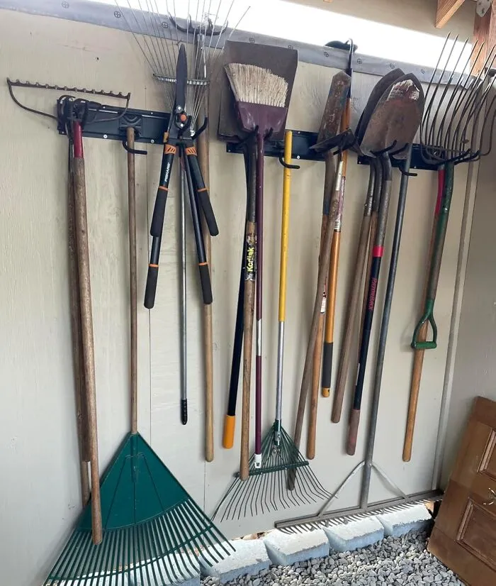 The Days Of Your Garden Tools Engaging In A Chaotic, Tangled Interpretive Dance In The Corner Of Your Shed Are Numbered Thanks To This <a Style="Display:inline;" Href="Https://Www.amazon.com/Organization-Multi-Purpose-Shovels-Trimmer-Folding/Dp/B0bhsj8g8g?ie=utf8&th=1&linkcode=ll1&tag=bpowl-20&linkid=1a2972cef3564bff452c380d85d3e907&language=en_us&ref_=as_li_ss_tl" Target="_blank"><span Style="Font: Inherit; Color: #d74b1f;"> Garden Tool Rack </Span>