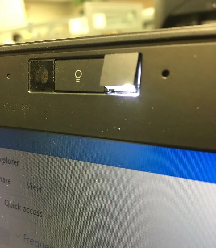 An Old Laptop We Dug Up At Work Uses An Overhead Light To Illuminate The Keyboard