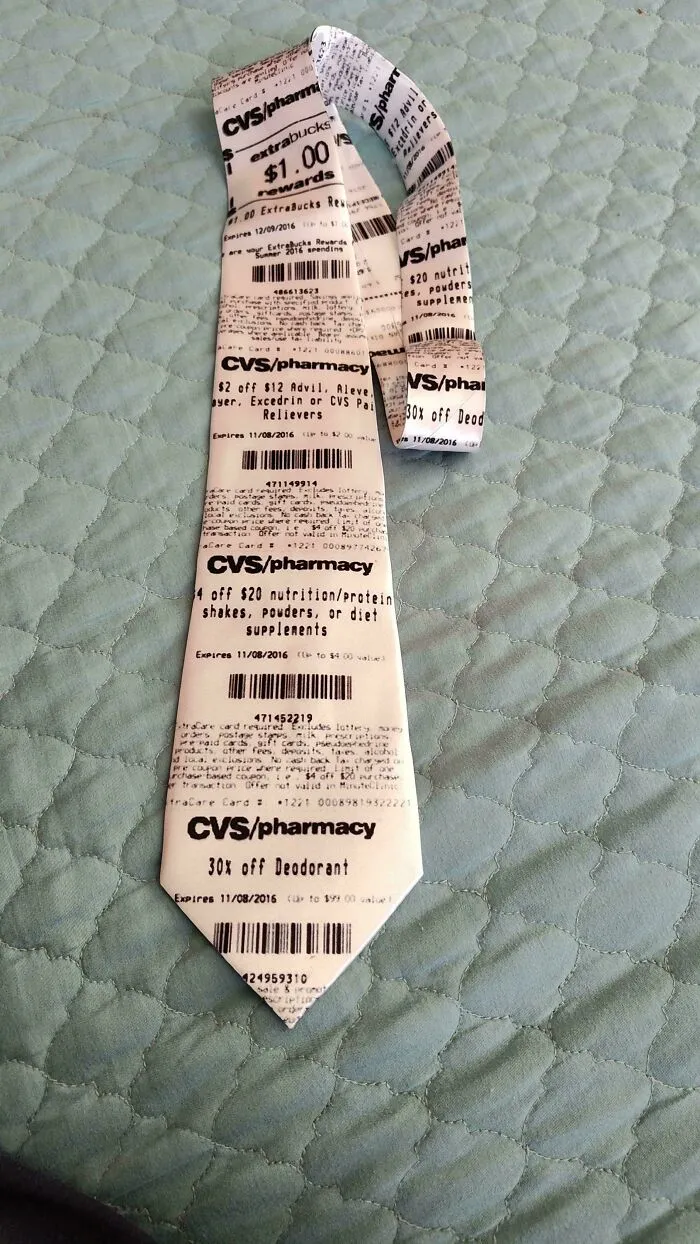 Tie made from CVS pharmacy receipts with visible coupons, a creative example of random Gen Z memes humor.