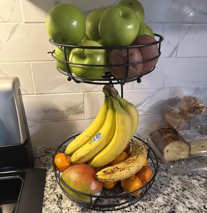 Your Kitchen Counter Refresh Includes A Major Upgrade For Your Fruit With <a Style="Display:inline;" Href="Https://Www.amazon.com/Auledio-2-Tier-Countertop-Vegetables-Storage/Dp/B08njkqhln?ie=utf8&th=1&linkcode=ll1&tag=bpbat-20&linkid=8f4f29d69bb34949c346ce6dad49b532&language=en_us&ref_=as_li_ss_tl" Target="_blank"><span Style="Font: Inherit; Color: #d74b1f;"> This 2-Tier Fruit Basket That Even Has A Banana Hanger</Span>, So Your Produce Can Live Its Best, Bruise-Free Life In Style