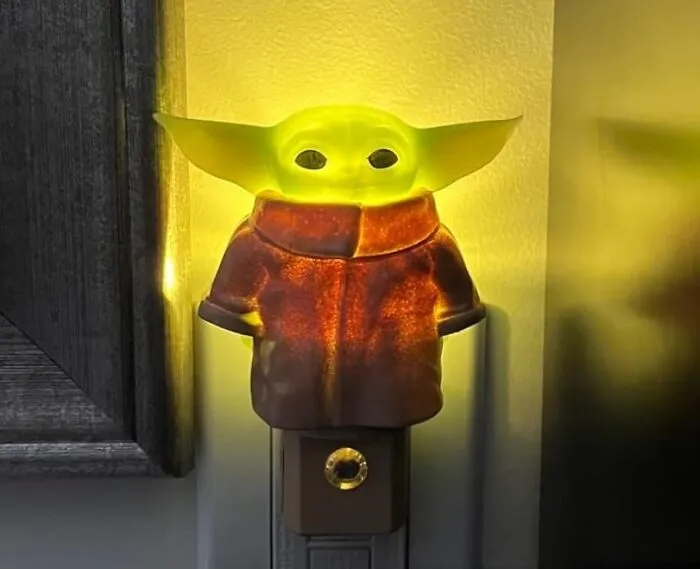 Feel The Calming Presence Of The Force (And Avoid Stubbing Your Toe On The Way To The Bathroom) With This Wise And Whimsical <a Style="Display:inline;" Href="Https://Www.amazon.com/Star-Wars-Mandalorian-Ul-Certified-53233/Dp/B08hk177pg?ie=utf8&th=1&linkcode=ll1&tag=bpbison-20&linkid=eef732c2f329d129c39f9e4d51ada505&language=en_us&ref_=as_li_ss_tl" Target="_blank"><span Style="Font: Inherit; Color: #d74b1f;"> Yoda Plug-In Nightlight </Span> To Instantly Boost Your Mood When Darkness Falls