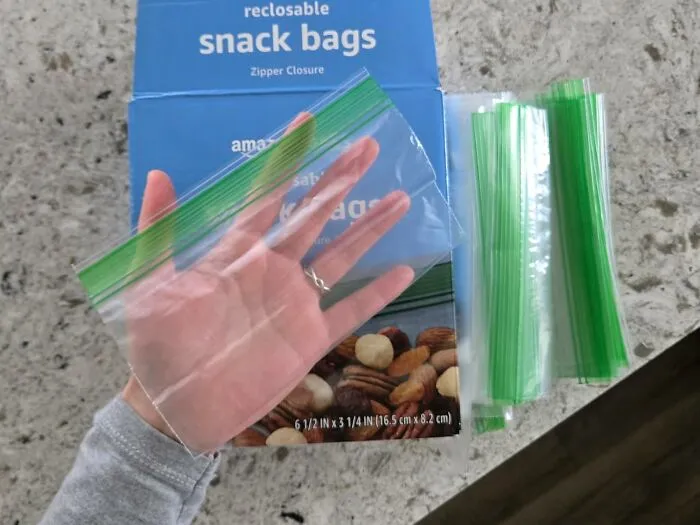 Embrace Your Most Ambitious Snack-Packing Dreams Because With <a Style="Display:inline;" Href="Https://Www.amazon.com/Amazon-Basics-Storage-Previously-Solimo/Dp/B095pmd8jg?ie=utf8&th=1&linkcode=ll1&tag=bpcrocodile-20&linkid=1dff83622699079532c0afcffdb71928&language=en_us&ref_=as_li_ss_tl" Target="_blank"><span Style="Font: Inherit; Color: #d74b1f;"> 300 Snack Bags </Span>, You're Basically Set Until The Next Millennium, Or At Least Next Tuesday If You're A Serious Snacker