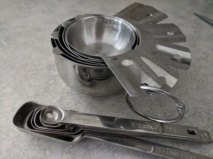 Your Baking Game Is About To Get A Serious Upgrade In Precision And Style, Leaving Those Flimsy Plastic Things In The Dust, With This Sleek <a Style="Display:inline;" Href="Https://Www.amazon.com/Kitchen-Essentials-Cooking-Baking-Stainless-Steel-Measuring-Cups-Set-Staple/Dp/B01e2hu4a2?ie=utf8&th=1&linkcode=ll1&tag=bplion-20&linkid=2522ba29bf93f9a3e20d83f219605200&language=en_us&ref_=as_li_ss_tl" Target="_blank"><span Style="Font: Inherit; Color: #d74b1f;"> Stainless Steel Measuring Spoons And Cups </Span> Set