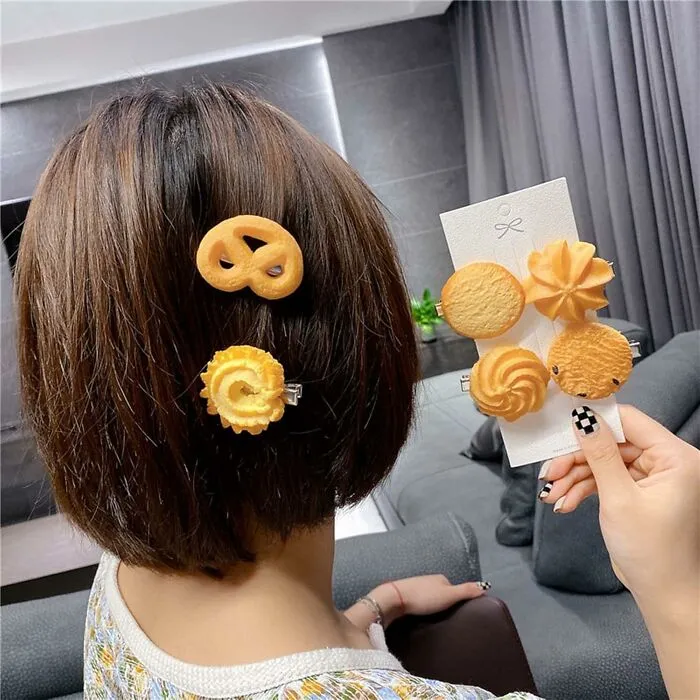 Your Hairstyle Is About To Get A Seriously Sweet Upgrade With These <a Style="Display:inline;" Href="Https://Www.amazon.com/Dp/B0b65dbbqh?ascsubtag=7865117%2c1%2c37%2cd%2c0%2c0%2c0%2c1396%3a1%3b900%3a2%3b974%3a2%3b1338%3a1%2c61748834%2c0%2c0%2cgoogle&btn_ref=srctok-B63a885a366bcaa8&linkcode=ll1&tag=bpcobra-20&linkid=cc6a749fd69c320d86394f30254a5e79&language=en_us&ref_=as_li_ss_tl" Target="_blank"><span Style="Font: Inherit; Color: #d74b1f;"> Cookie Barrettes </Span>, Because Who Doesn't Want Their Hair To Look Like A Delicious, (Thankfully) Non-Crumbly Treat?