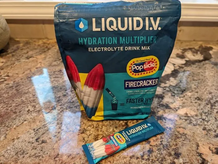 Your Summer Hydration Game Is About To Get A Serious, Electrolyte-Packed Upgrade You've Probably Seen All Over Your Feed Thanks To <a Style="Display:inline;" Href="Https://Www.amazon.com/Liquid-I-V-Hydration-Multiplier-Firecracker/Dp/B0chn5d13p?ie=utf8&th=1&linkcode=ll1&tag=bpshark-20&linkid=706baa5f65cb87851580c8b3cba98cd6&language=en_us&ref_=as_li_ss_tl" Target="_blank"><span Style="Font: Inherit; Color: #d74b1f;"> Liquid I.v.</Span>