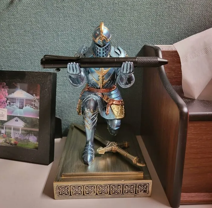 Your Ordinary Ballpoint Is About To Get A Serious Promotion To "Sacred Scribe Of The Realm" When It's Presented By This <a Style="Display:inline;" Href="Https://Www.amazon.com/Hdmbigmi-Knight-Organizers-Accessories-Organizer/Dp/B0bb2j11k5?ie=utf8&th=1&linkcode=ll1&tag=bpcobra-20&linkid=89aaa9570c6bc5487b208468d6cc108f&language=en_us&ref_=as_li_ss_tl" Target="_blank"><span Style="Font: Inherit; Color: #d74b1f;"> Knight's Guard Pen Holder </Span>, Making Even Your Grocery List Feel Like A Royal Decree