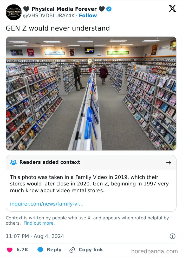 Interior of a nostalgic video rental store with rows of DVDs, showing rose tinted tolerance for past media culture.