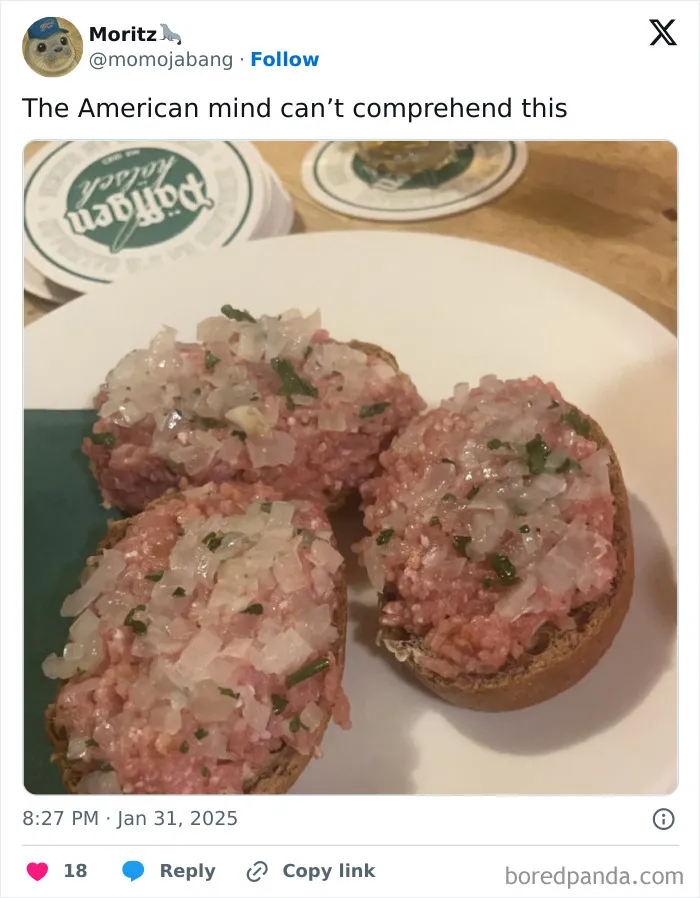 Three slices of bread topped with raw minced meat and finely chopped onions, confusing American mind.