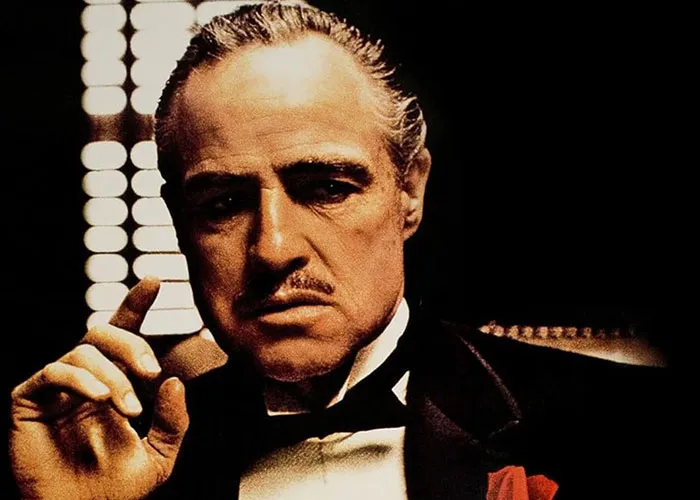 Classic film scene with a man in a tuxedo, portraying a memorable moment with entertaining facts discussed on X.