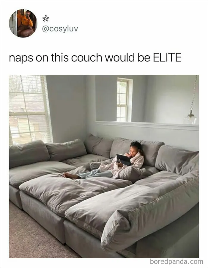Person relaxing on a large gray couch, highlighting comfort in funny memes about being one inconvenience from meltdown.