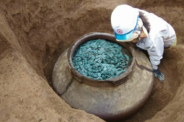 Bronze Coins Buried In A Ceramic Jar