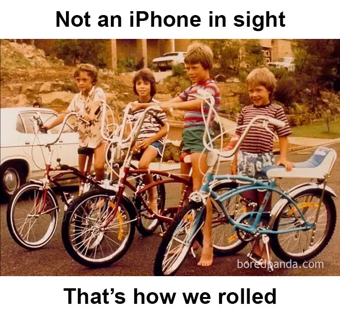Kids riding vintage bikes with tall handlebars, showcasing nostalgia and rose tinted tolerance in a playful street setting.