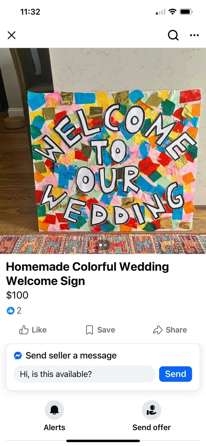 Homemade colorful DIY wedding welcome sign with bold letters and multicolored paper pieces on a wooden floor.